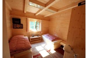 Ferienhaus - Blockhaus von innen – Schlafzimmer