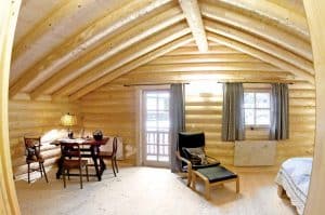Wohnblockhaus aus Rundholzstämmen Schlafzimmer