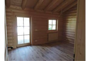Wohnhaus - Blockhaus mit runden Balken von innen – Schlafzimmer